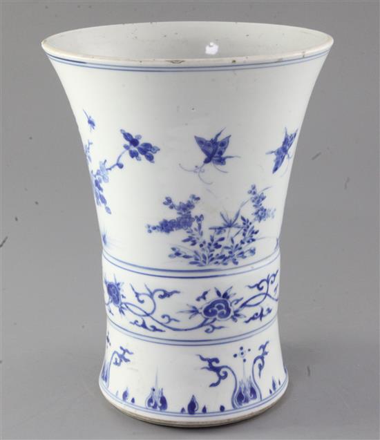 A Chinese blue and white gu-shaped vase or brush pot, Transitional period, mid 17th century, height 24.5cm, diameter 18.5cm, firing cra